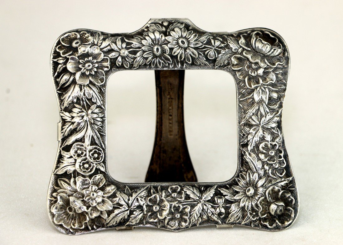 S. KIRK & SONS STERLING PICTURE FRAME.: KIRK & SONS STERLING PICTURE FRAME.United state, c.1900.Repousse silver decorated with variety kind of flowers.3.5 x 3.5".