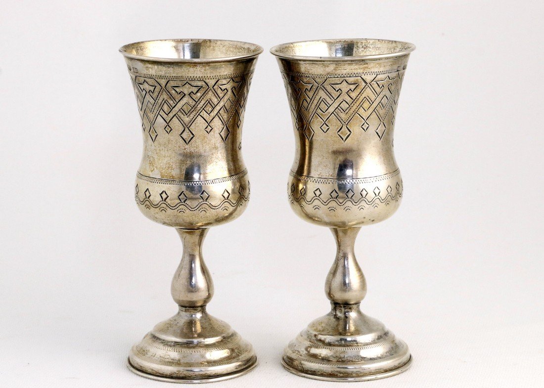 A PAIR OF SILVER KIDDUSH CUPS. Russian, 1888. In (1 of 1)