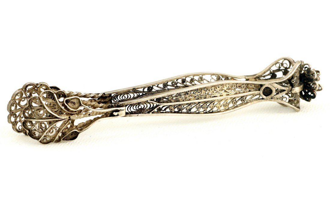 A PAIR OF SILVER FLILIGREE TONGS BY BEZALEL. Jerusalem, (1 of 1)