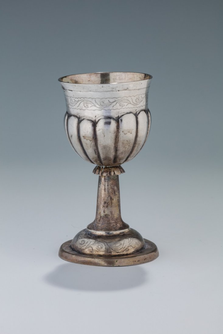 A SILVER KIDDUSH GOBLET. Poland, c. 1820. On round (1 of 1)