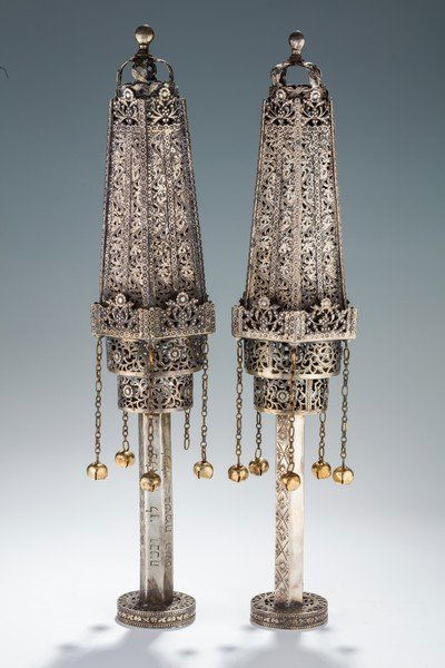 A PAIR OF MONUMENTAL SILVER TORAH FINIALS. North (1 of 1)