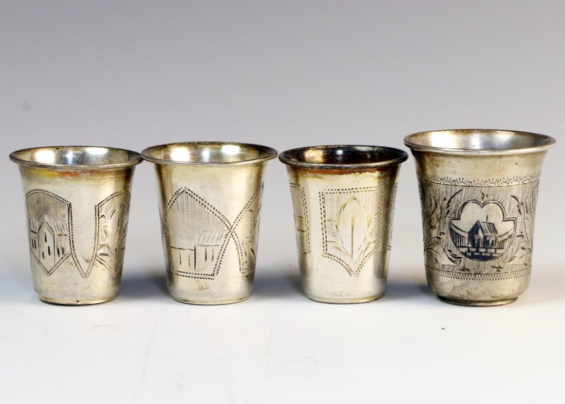 A GROUP OF FOUR SILVER BEAKERS. Russian, 19th century. (1 of 1)