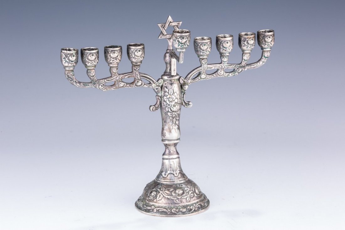 A SILVER CHANUKAH MENORAH. Germany, c. 1880. On round (1 of 1)