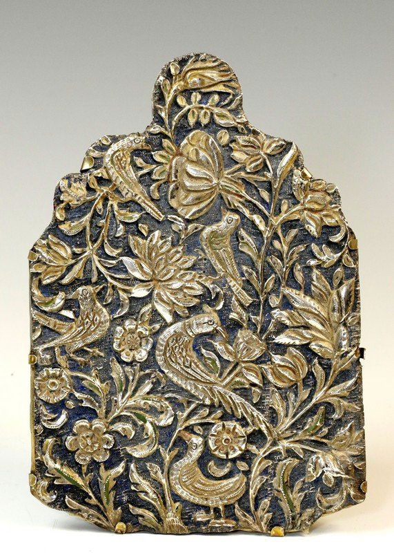 A SILVER AMULET HOLDER. Persian, c. 1930. Chased with (1 of 1)