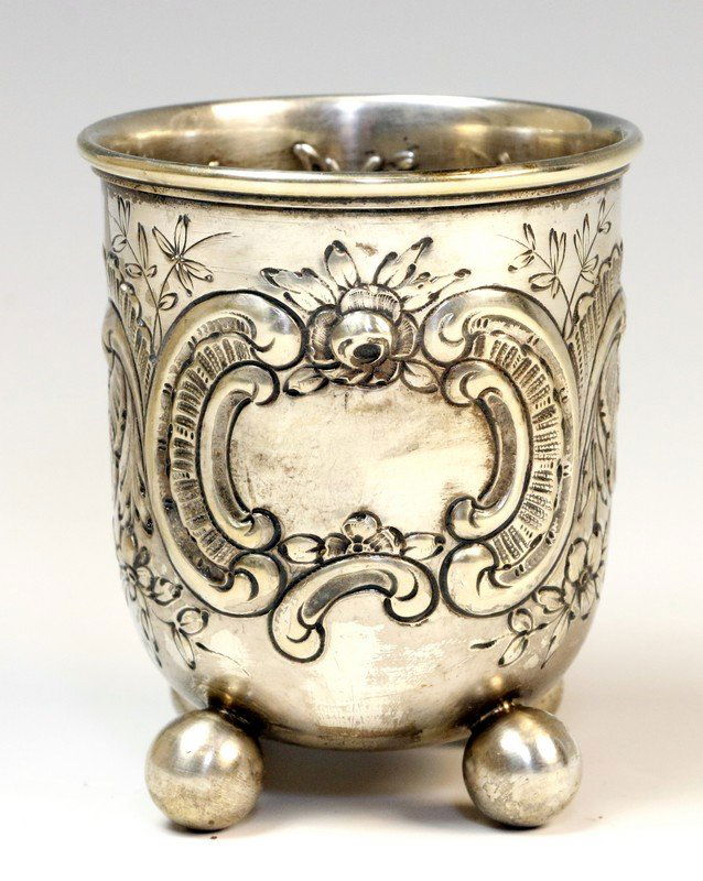 A SILVER KIDDUSH BEAKER. Germany, 19th century. On four (1 of 1)