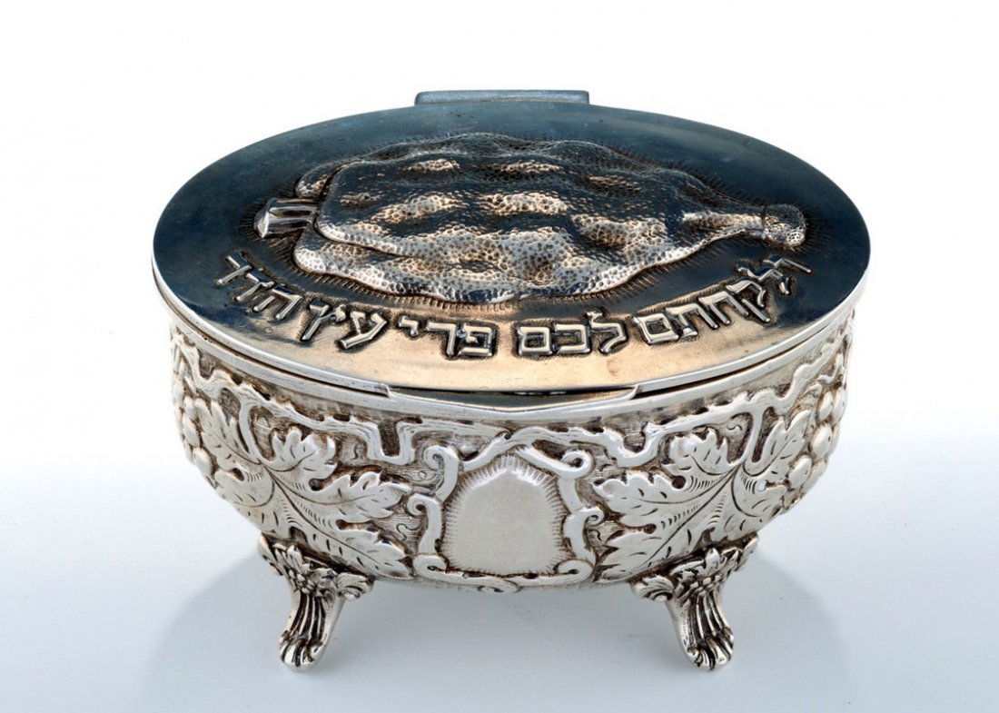 A SILVER ETROG CONTAINER. Italy, 20th century. On four (1 of 1)