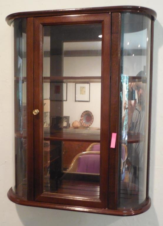 Mirrored Wall Curio Cabinet: Three Tier, Single Door, 25" X 20 1/2" X 6". This Lot Is Locate Onsite And Will Be Available To Pick Up On Wednesday July 30th