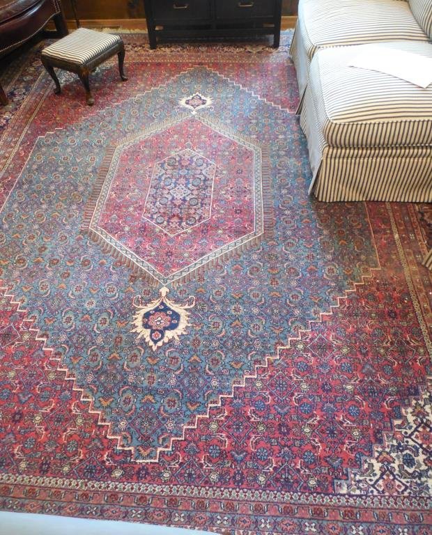 Large Area Rug: Geometric Design, 9' X 12'. This Lot Is Locate Onsite And Will Be Available To Pick Up On Wednesday July 30th