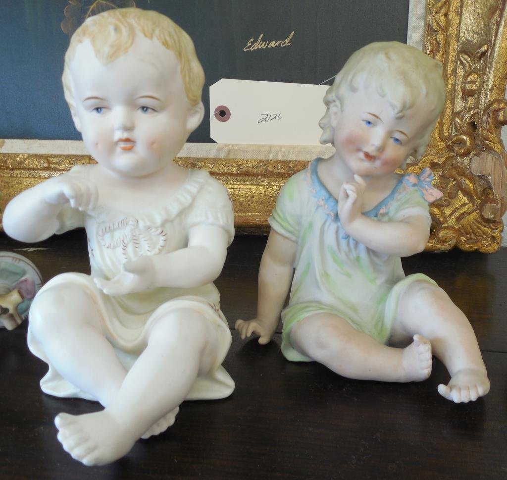 Piano Babies, 2 Pieces: Bisque, (1) H 7", (1) H 6 1/2"