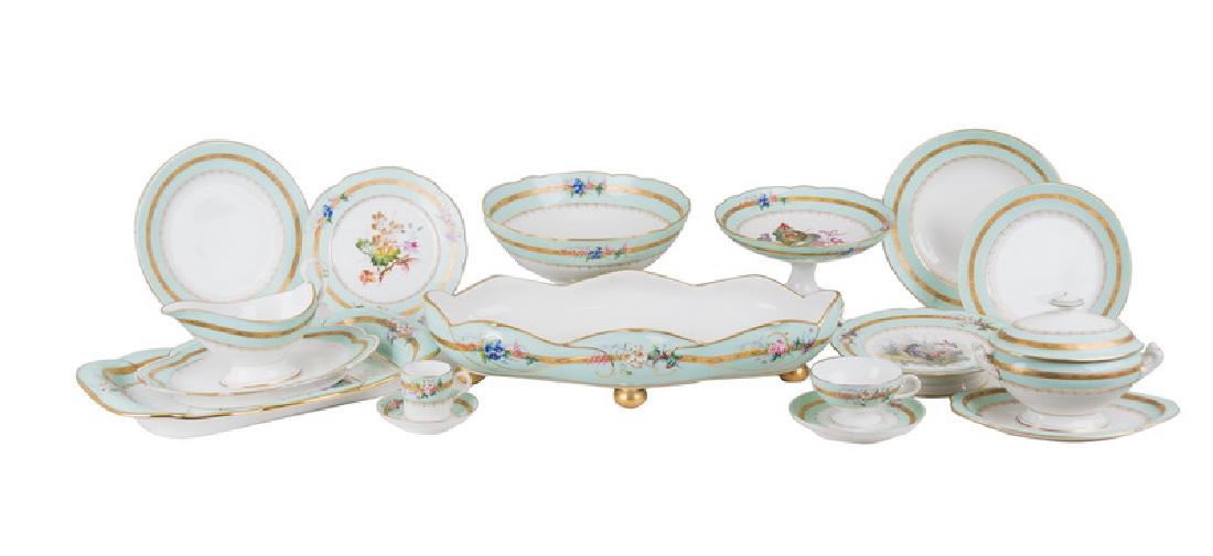 CONTINENTAL PAINTED PORCELAIN DINNER SERVICE: mint green background with bands of gold and decorated with floral bouquets and birds. Comprising 28 plates, 17 dessert plates, 16 bread and butter plates, 19 bowls, 14 tea cups, 21 demitasse cups, 45