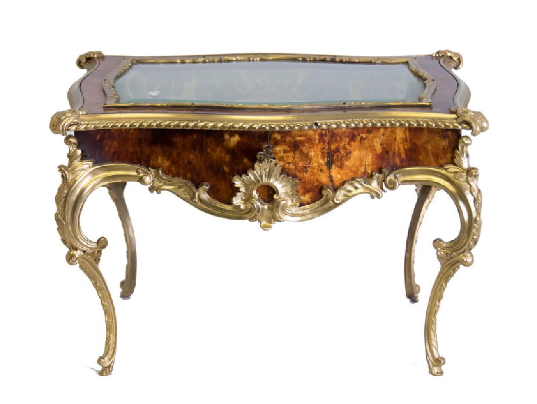 FRENCH GILT BRONZE MINIATURE VITRINE TABLE: 10 1/8 inches high; 15 inches wide; 11 1/4 inches deep