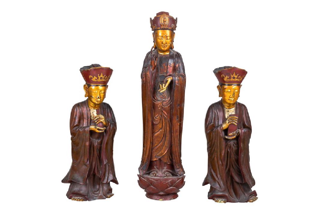 SET OF THREE VIETNAMESE CARVED WOOD & GILT LACQUERED: Provenance: Estate of John Robert Weber the tallest: 40 inches high; the others, 29 & 30 inches high