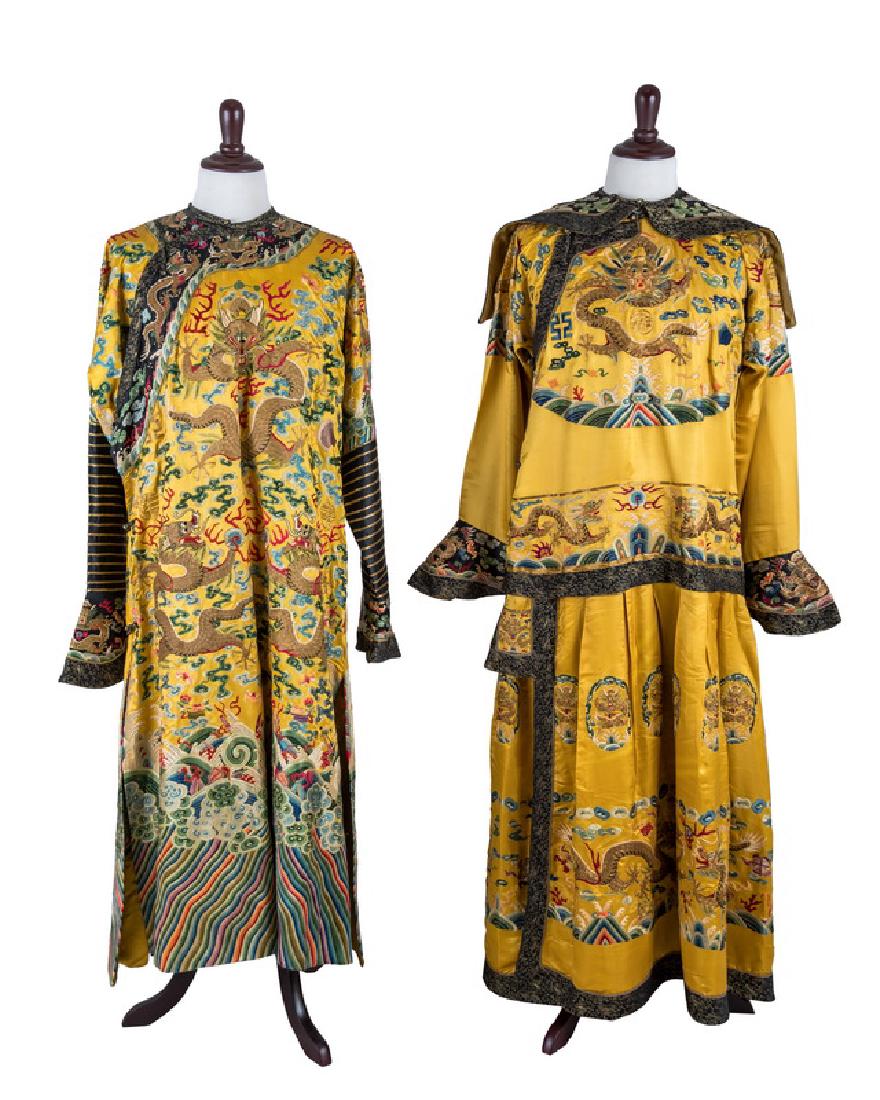 PAIR OF CHINESE "IMPERIAL" COURT ROBES: each highly decorated yellow and black robe embroidered with dragons and traditional Chinese motifs throughout Provenance: The Estate of John Robert Weber