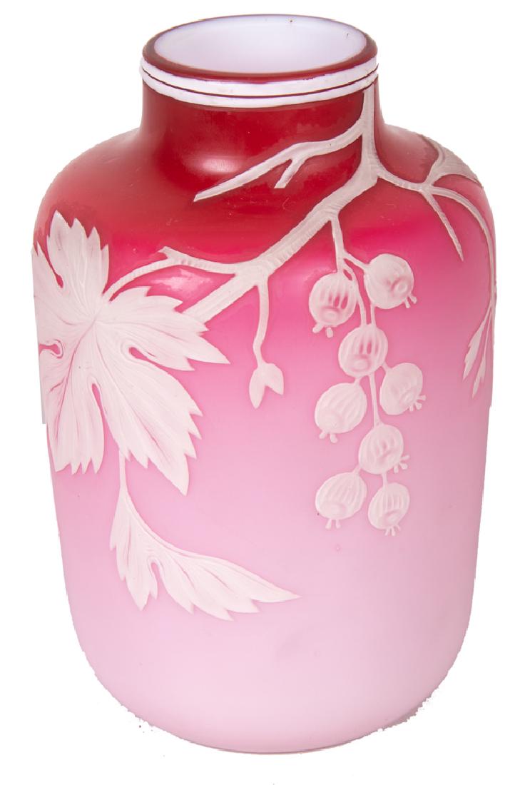 THOMAS WEBB CAMEO GLASS VASE: body in gradual ombre glass shades of red to pink; white overlay of gooseberries vines base marked 676/5 7 1/2 inches high
