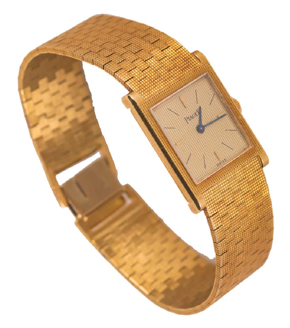 PIAGET 18 KARAT GENTLEMAN'S WATCH: stamped '750' on clasp; inscribed and marked '931C4 78336' on back; with a mesh brick work yellow gold bracelet closing with an integrated concertina clasp 70.6 grams 7 1/2 inches long