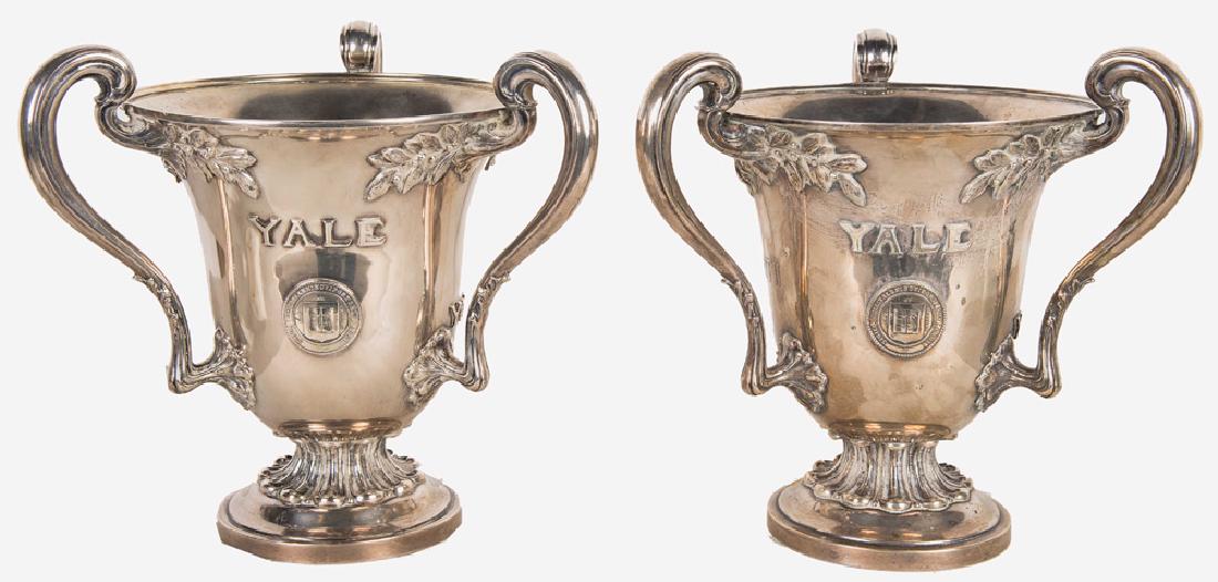 PAIR OF YALE PRESENTATION STERLING SILVER LOVING CUP: one presented to Thomas Henry Garrett II April 2nd 1913 by Omicron and the other presented to Marion Hatch Fisher'04, June 28, 1913 by Omicron 52 troy ounces each each: 10 inches high