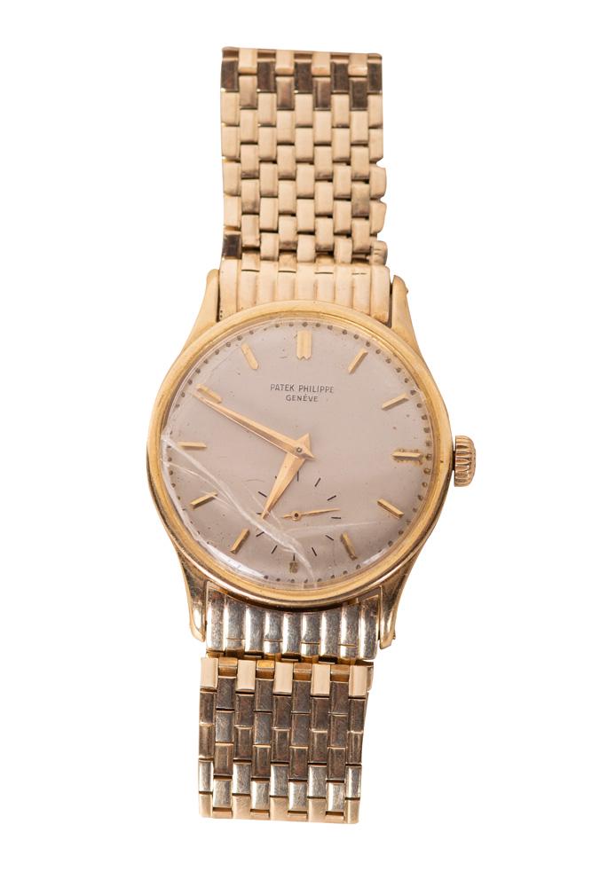 PATEK PHILIPPE: 18 KARAT DRESS WATCH: Condition: with cracked crystal