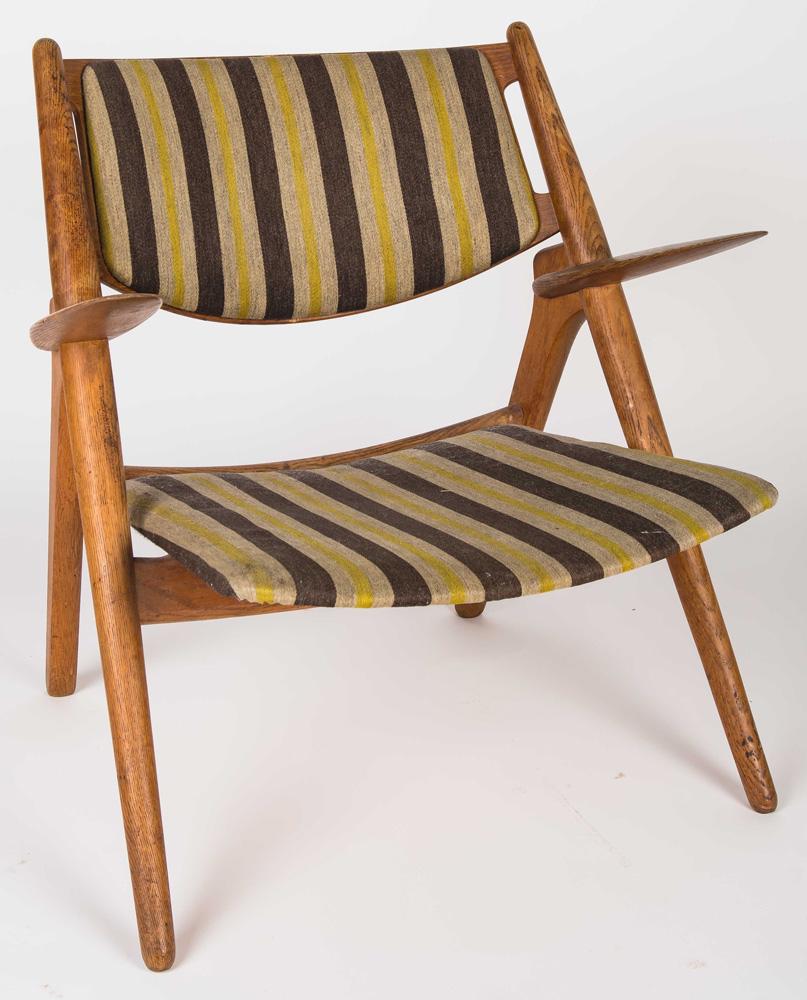 HANS WEGNER: SAWBUCK CHAIR: Provenance: The Estate of Mario Zamparelli Condition: with original rare stripe upholstered back and cushion 28 1/2 inches high