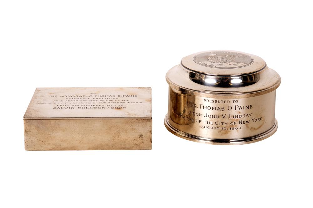 TWO TIFFANY & CO. STERLING PRESENTATION BOXES: the round box inscribed "Apollo 11" the rectangular box inscribed "To the Honorable Thomas O. Paine Scientist, Executive, Able Administrator of one of the most important programs in our nations histor