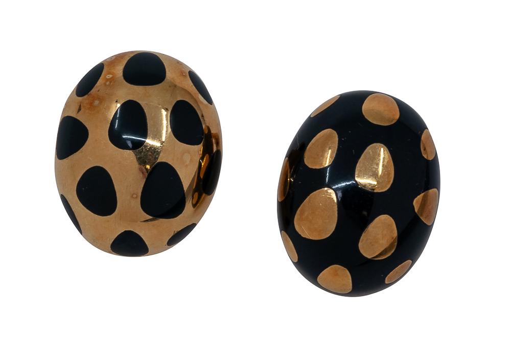 PAIR OF TIFFANY & CO. 18 KARAT GOLD & JADE DOME: in the style of Angela Cummings (not marked) the positive/negative design featuring opaque black natural and gold 18.7 grams