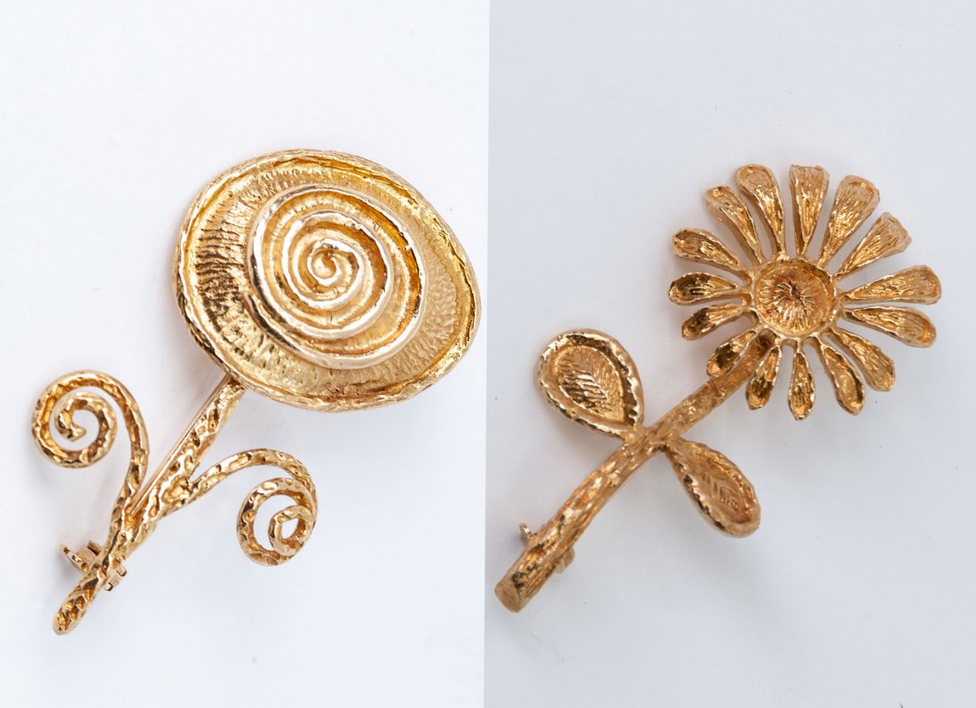 TWO ASSORTED LALAOUNIS 18 KARAT GOLD FLOWER BROOCHES: depicting a rose and daisy 21.3 total grams the rose: 46 mm high; the daisy: 52 mm high