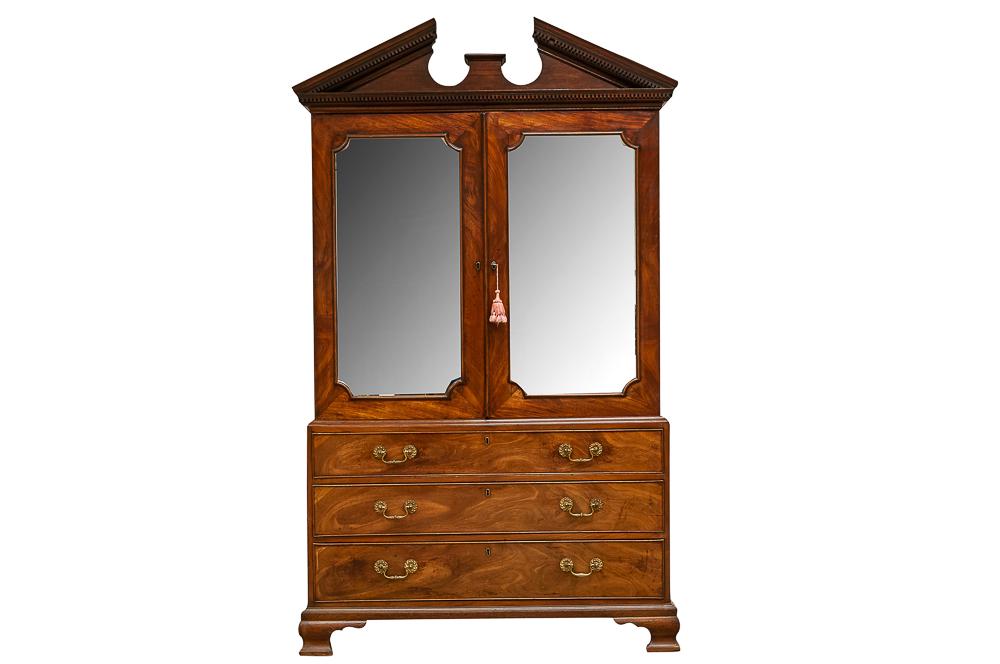 ENGLISH CARVED MAHOGANY LINEN PRESS: in two parts 50 inches wide; 24 inches deep; 83 inches high