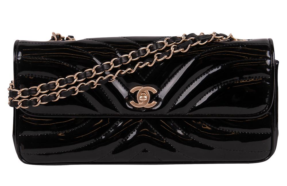 CHANEL BLACK PATENT LEATHER WAVE STITCH BAG: circa 2003-2004 with gold-tone hardware and hologram sticker 11 inches wide; 2 3/4 inches deep; 5 1/4 inches high