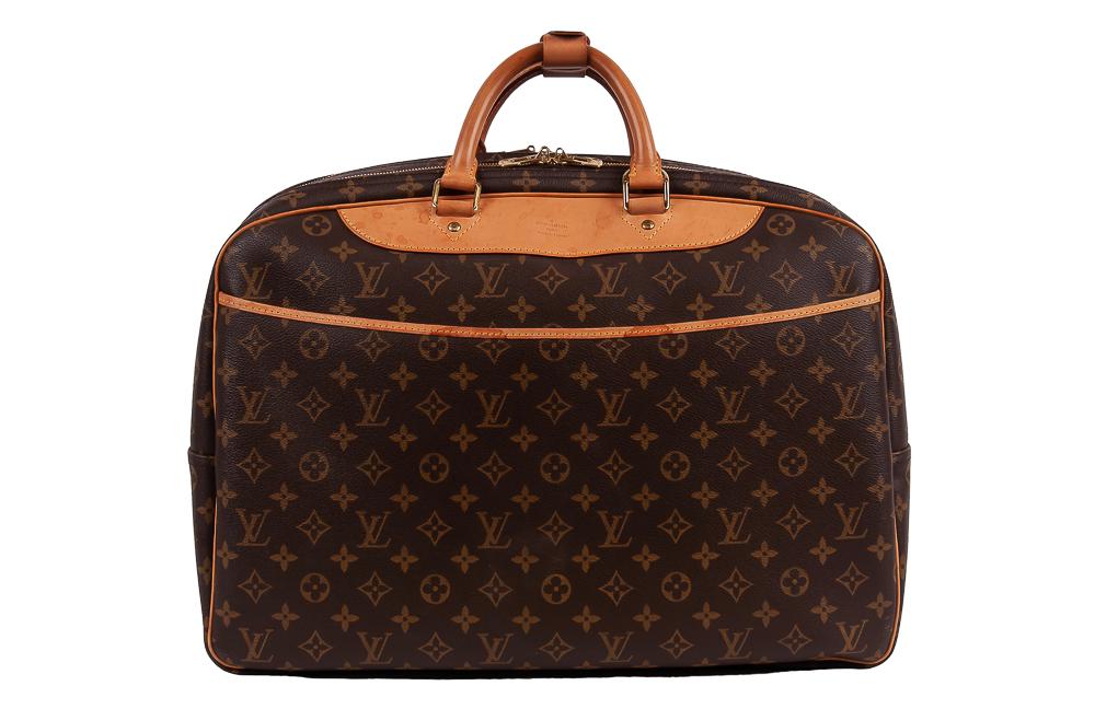 LOUIS VUITTON MONOGRAM ALIZE 24 HEURES: brown and tan monogram coated canvas 18 1/2 inches wide; 7 1/4 inches deep; 14 inches high