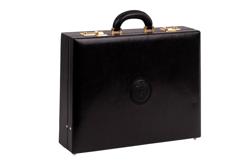 VERSACE BRIEFCASE: a black fitted smooth leather case with logo embossed medallion 17 inches wide; 3 1/2 inches deep; 12 1/2 inches high