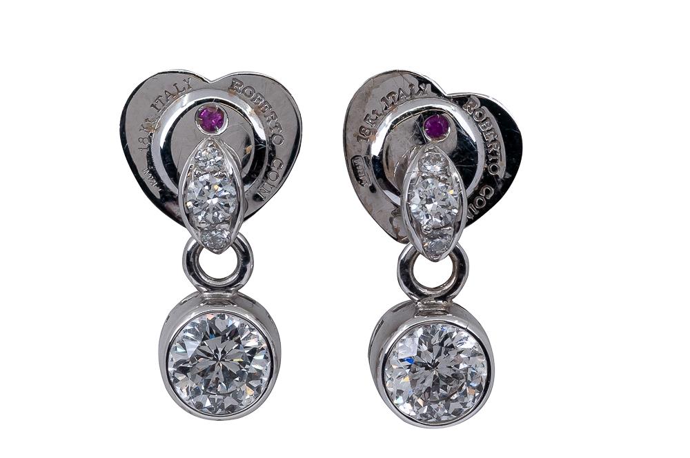 PAIR OF ROBERTO COIN 18 KARAT WHITE GOLD & DIAMOND: containing two modified round brilliant diamonds [G/VS] weighing approximately 1.33 carats total, and six smaller diamonds weighing approximately 0.32 carats total 4.4 grams 15 mm long