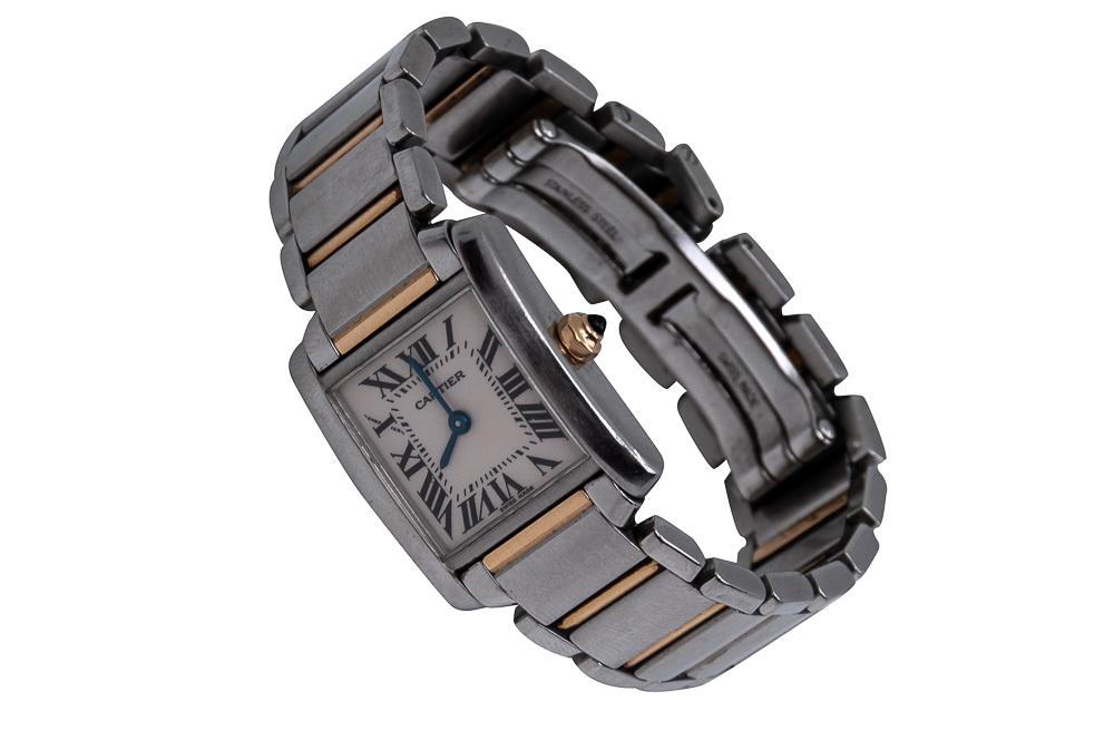 CARTIER TANK FRANCAISE STAINLESS STEEL & 18 KARAT: the square white dial measuring 16.225 x 15.15 mm, signed 'Cartier' under 12:00; the back stamped 'Cartier', 'Water Resistant', "Swiss Made', and case #2384, serial #317712CD the bracelet measuring 6 