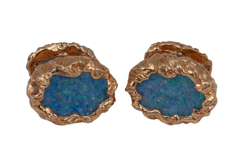 PAIR OF RUSER 18 KARAT & 14 KARAT YELLOW GOLD & OPAL: containing two very well matched oval tablet cut black opal triplets, bezel set; measuring 18.00 x 14.40 mm and 19.30 x 13.00 mm each 27.4 grams