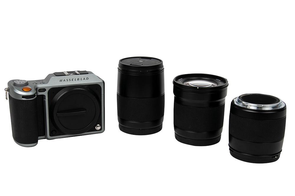 HASSELBLAD X1D-50C MEDIUM FORMAT CAMERA & THREE LENSES: Included lenses & accessories: XCD30 f/3.5, XCD45 f/3.5, XCD90 f/3.2 lenses, wall charger & original camera strap. Condition: Camera body shows normal wear due to use. Body is missing battery & batter