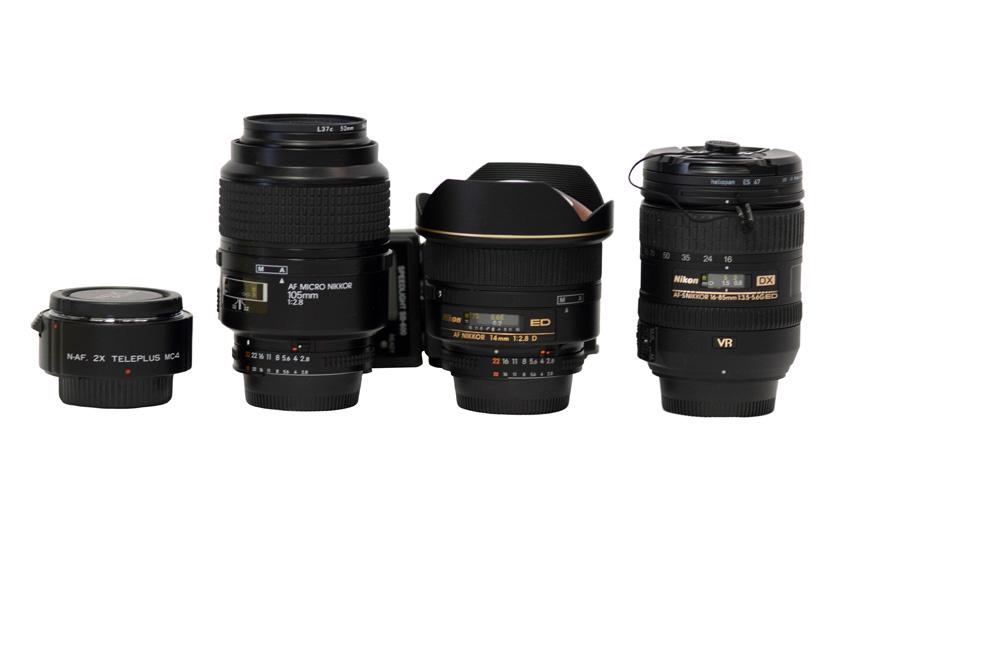 GROUP OF NIKON LENSES: comprising a Nikon 105mm F/2.8 Macro lens, Nikon 14mm F/2.8D lens, Nikon 16-85mm F/3.5-5.6 lens, Kenko Teleconverter, Digipro F exposure meter, Nikon SB-600 Speedlight