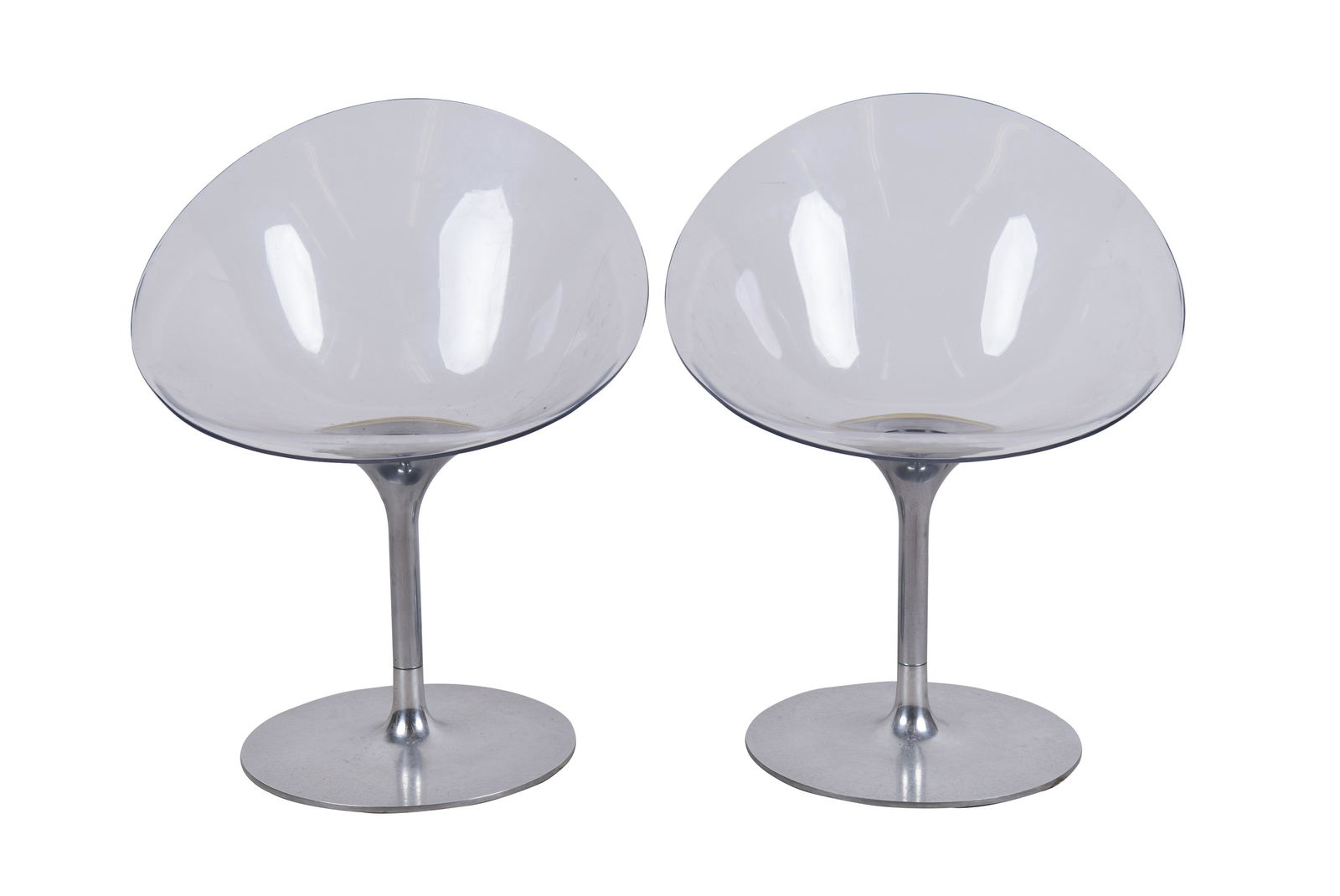 PAIR OF KARTELL EROS SWIVEL CHAIRS BY PHILIPPE STARCK: Condition: some pitting to chrome, acrylic with light surface scratches 24 inches wide; 18 1/4 inches height to seat; 31 1/2 inches height to back