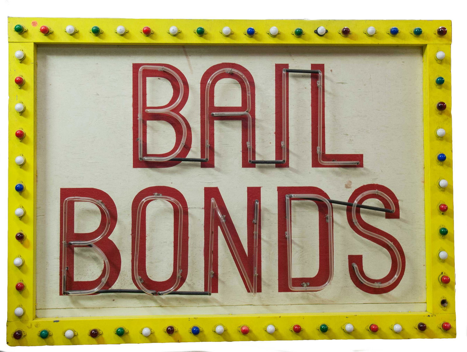 BAIL BONDS ADVERTISEMENT SIGN: spelled out in painted back and lighted tubes 74 inches wide; 9 inches deep; 53 1/2 inches high