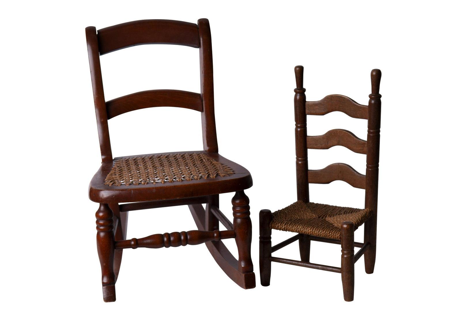 TWO MINIATURE CHAIRS: comprising a rocker and ladder-back side chair the rocker: 17 inches high