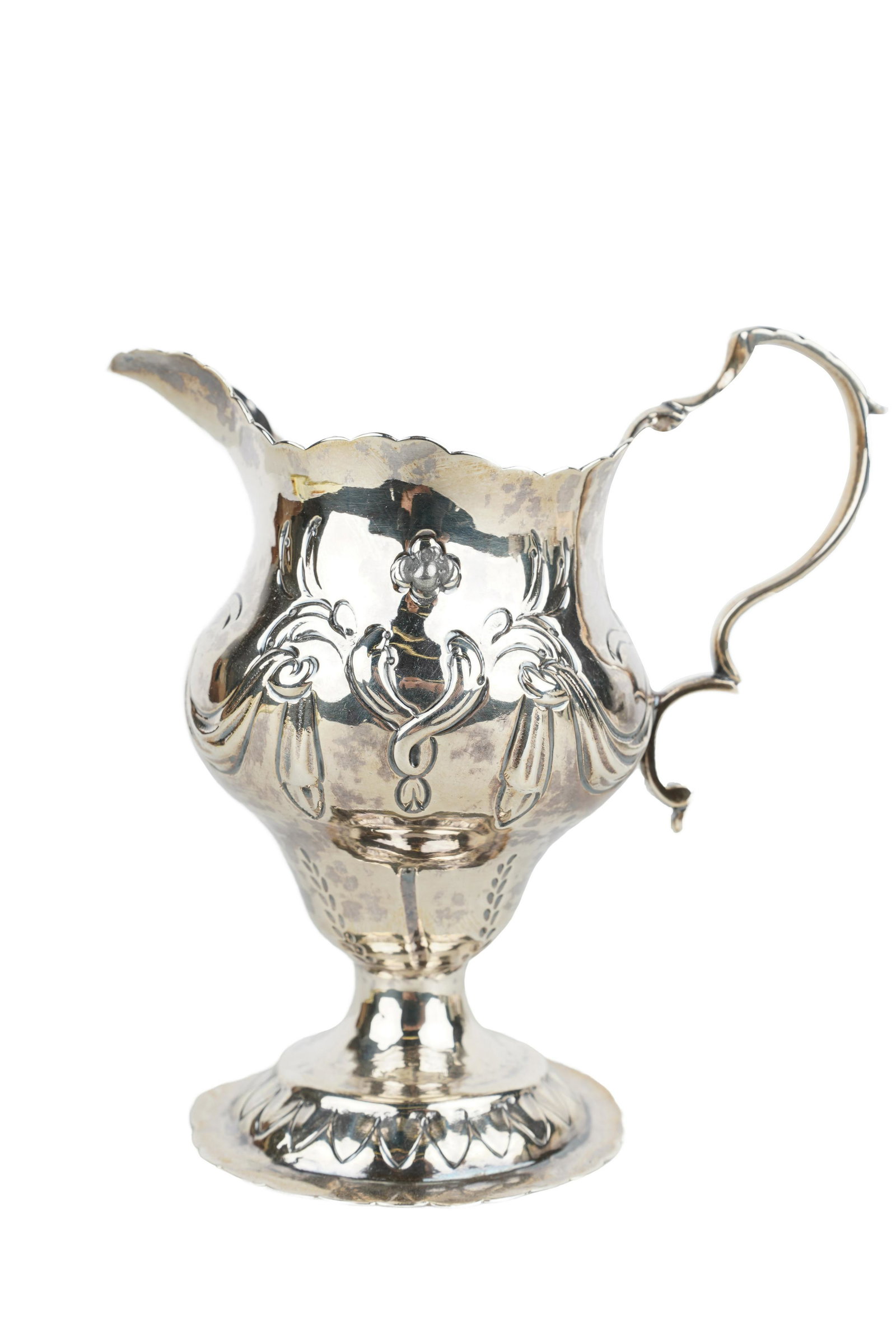 GEORGE III SILVER CREAM JUG: GS, London, 1776 2 troy ounces Provenance: The Estate of Judith Sterling Morse Plunkett 4 inches high