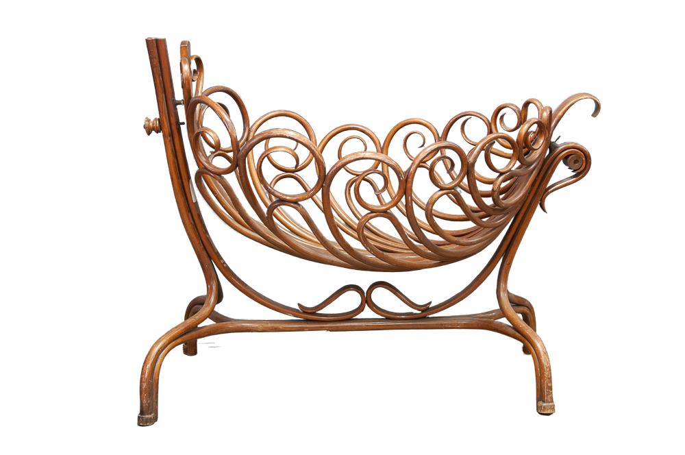 THONET STYLE BENTWOOD CRADLE: Condition: with scratching and wear to surface, with upper ornament missing, tape residue to frame 56 1/2 inches wide