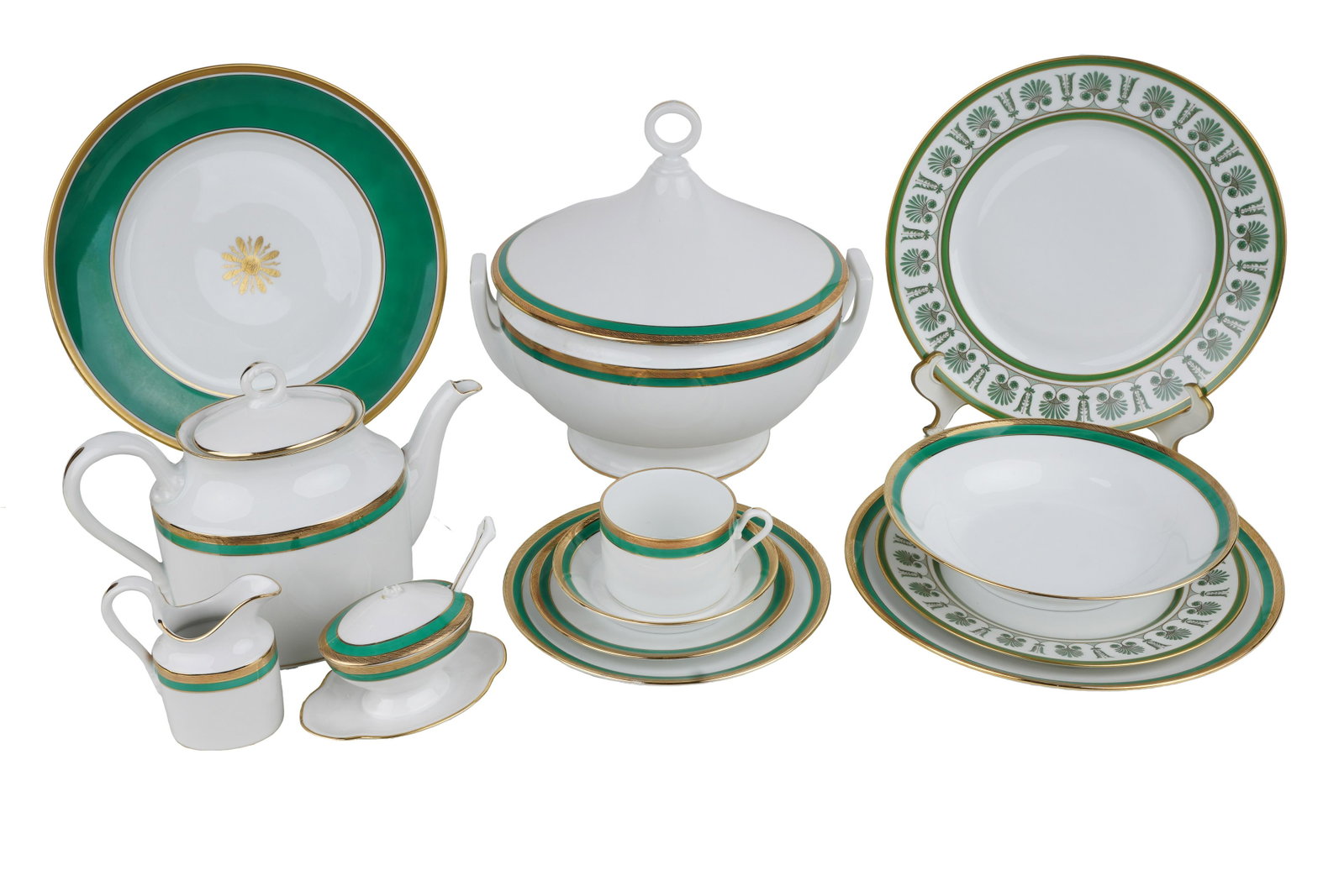 ASSEMBLED GINORI PORCELAIN DINNER SERVICE: in "Palermo Green": 20 large bowls (Condition: with chip to one) 13 cereal bowls, 14 salad plates, 14 bread plates; 13 coffee cups with 10 saucers, teapot, creamer, and covered sugar bowl (with broken