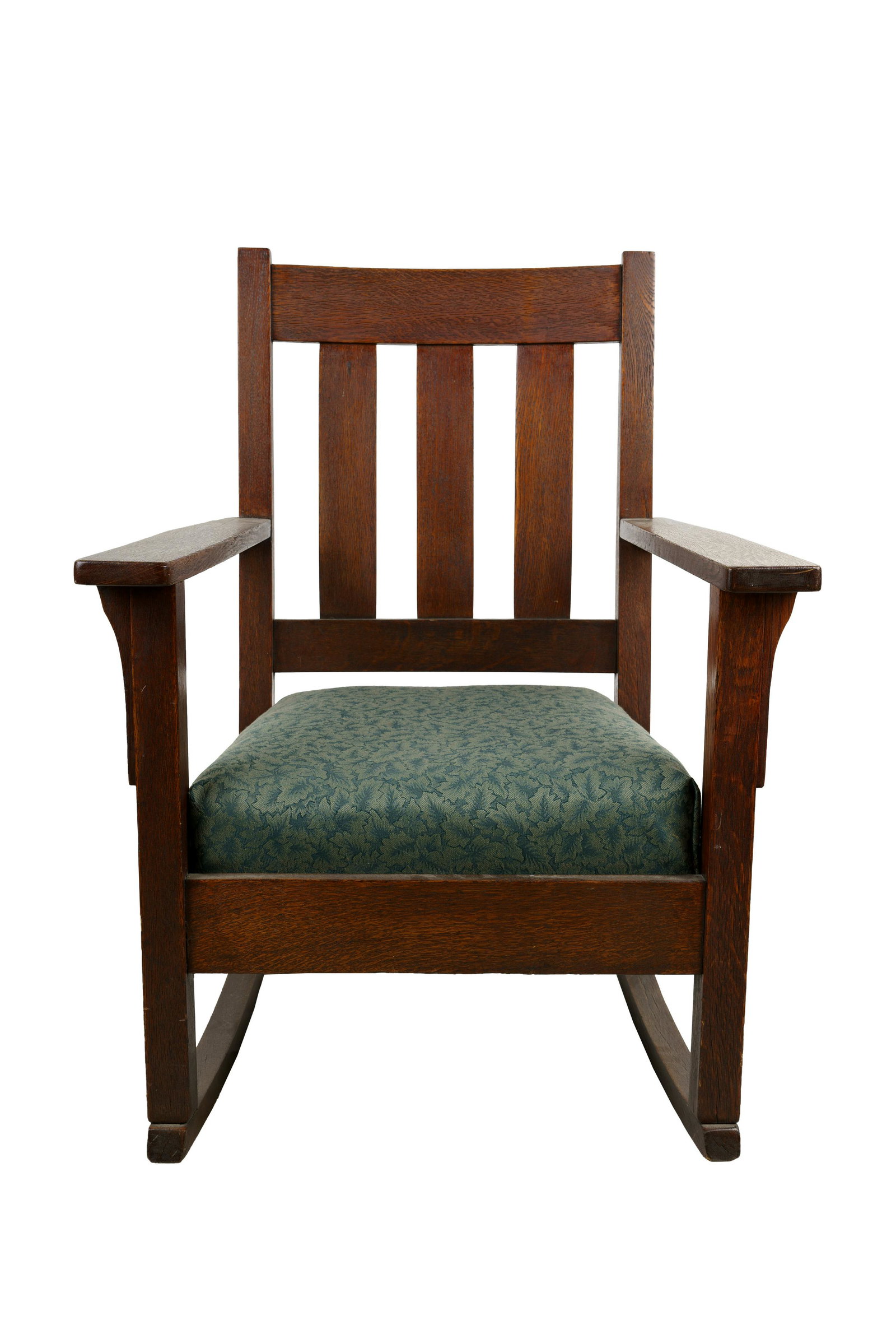 ARTS & CRAFTS OAK ROCKER: with removable cushion Condition: with nicks and scrapes on arms and feet 32 1/2 inches high total; 15 1/2 inches high to seat