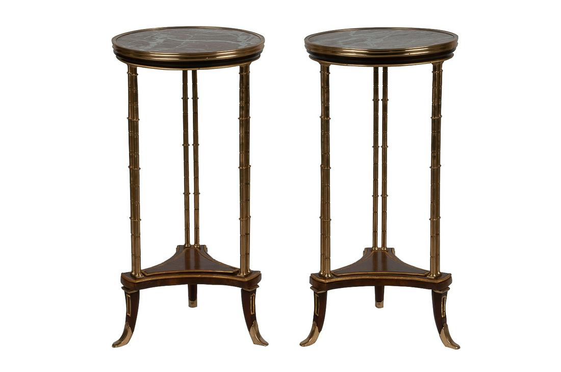 PAIR OF NEOCLASSICAL STYLE BRONZE GUERIDONS: each with a marble top 14 1/2 inches diameter; 29 3/4 inches high