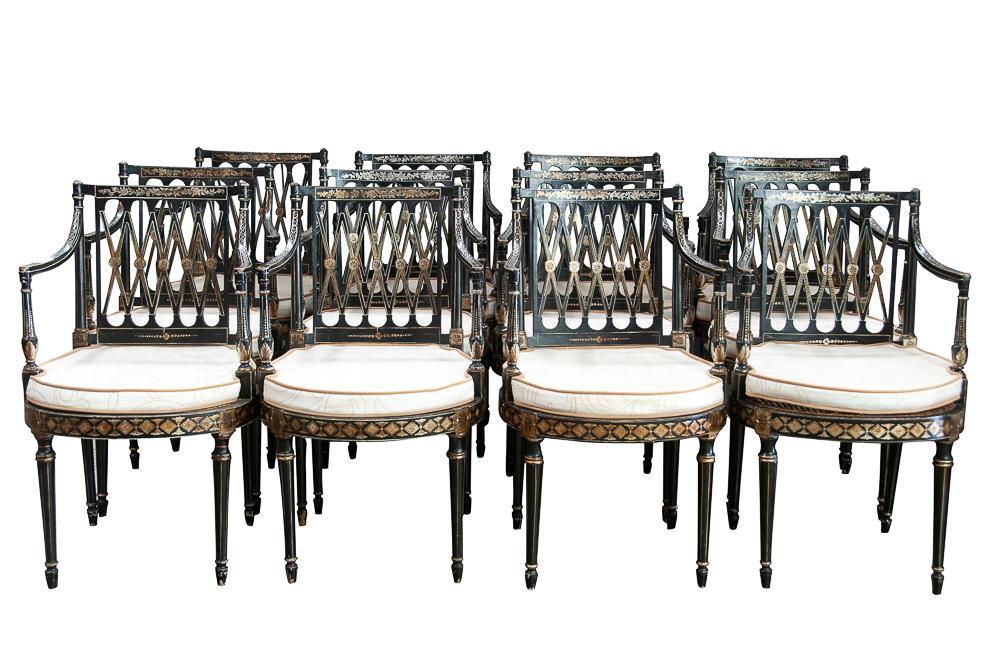 TWELVE PIERRE LOTTIER LACQUERED & PAINTED ARMCHAIRS: circa 1930 each with caned seat and later loose cushion Condition: each structurally sound, with minor separation to some joints and rubbed wear to decoration commensurate with age and use. each 20 in