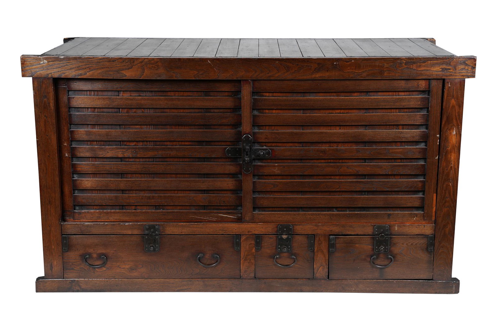 TANSU STYLE CABINET: with iron mounts and sliding doors Condition: general nicks and small losses, likely assembled 64 1/2 inches wide; 27 1/4 inches deep; 36 inches high