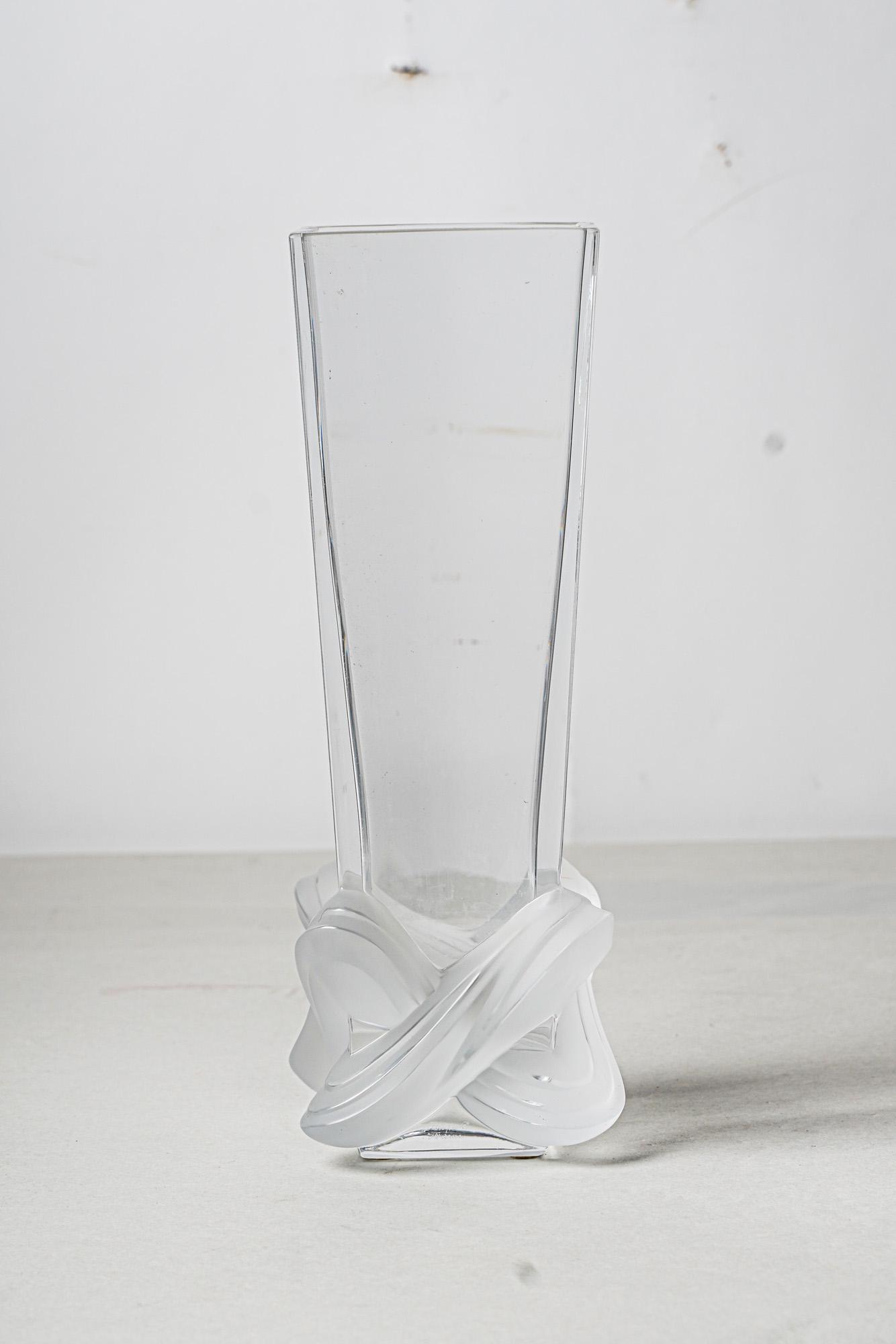 LALIQUE "LUCCA" GLASS VASE: after 1978 signed in script "Lalique France" with registered trademark symbol tapering body of clear glass with frosted glass interlaced "ribbon" molding to base Condition: felt pads applied to unders