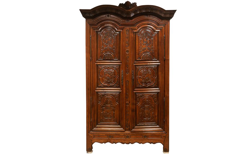 FRENCH CARVED WALNUT ARMOIRE: Condition: Good with typical nicks, gouges, stable cracks to timber and stable separation to joints commensurate with age. A small (1 inch by 1/2 inch) loss to left side at upper upper left corner of