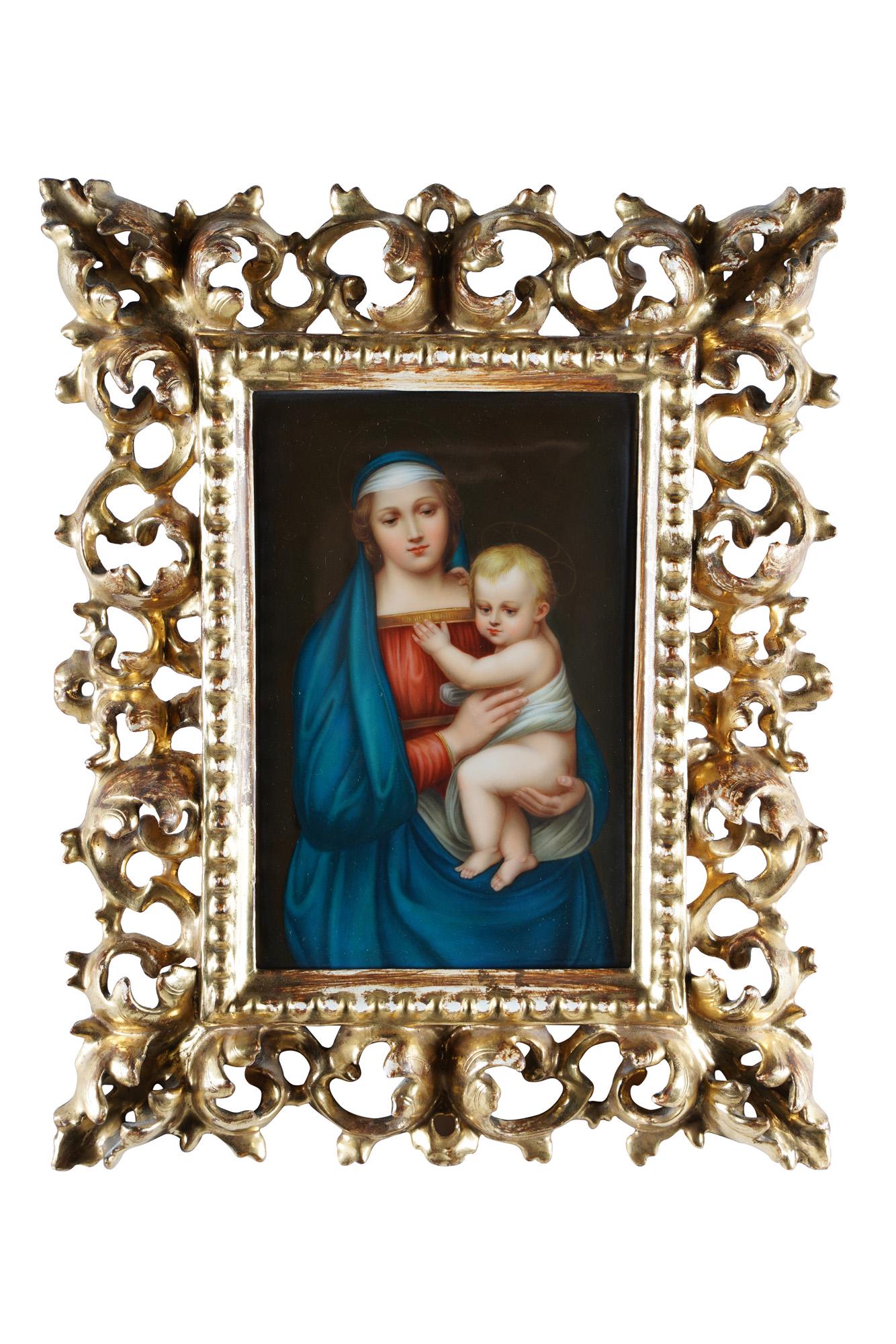 PLAQUE OF MADONNA & CHILD: porcelain after Raphael; in an ornate gilt frame Condition: good 6 3/4 x 4 1/2 inches; 11 1/2 x 9 inches total