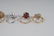 SIX ASSORTED 10 KARAT YELLOW GOLD RINGS - 9