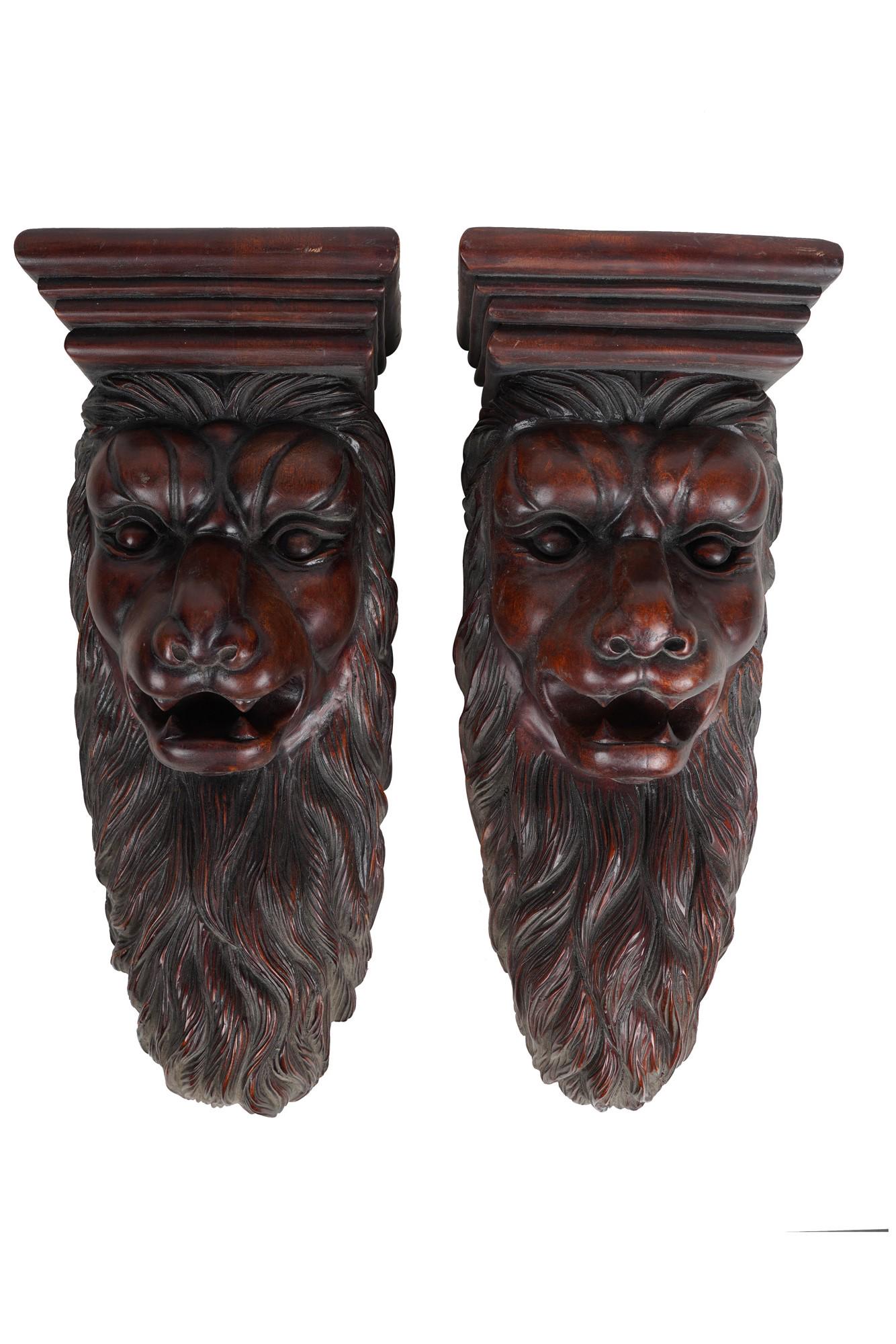 PAIR OF CARVED WOOD LION BRACKETS: Condition: with wear to tops 17 x 7 inches