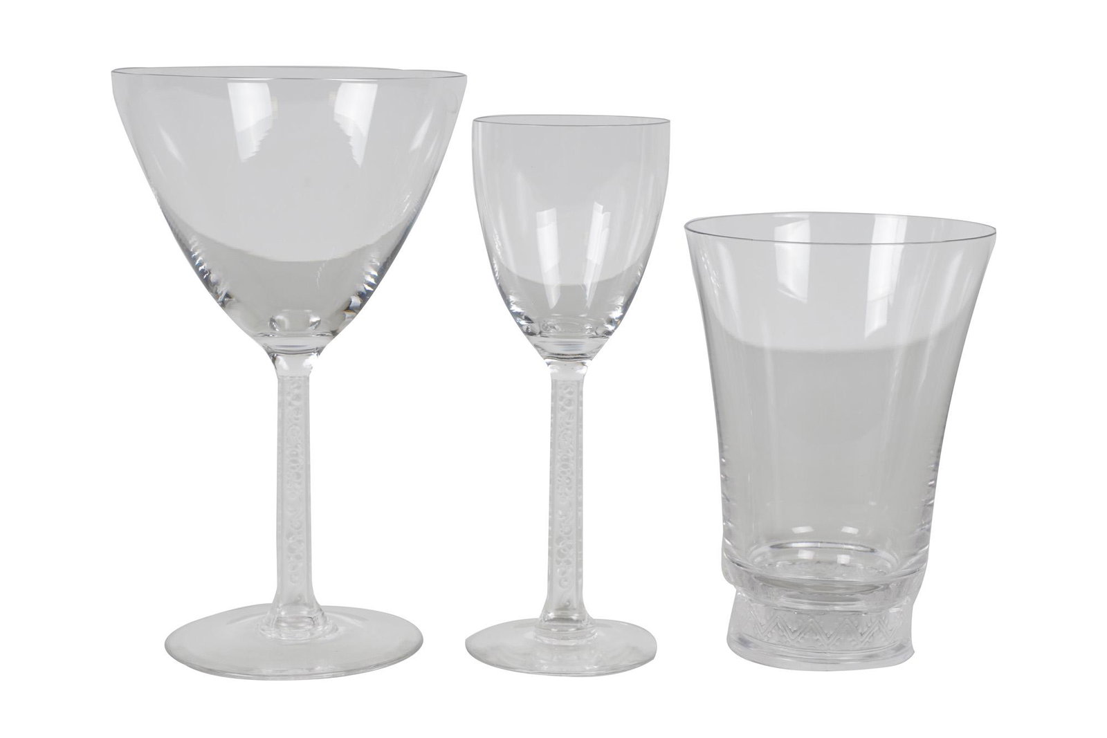 COLLECTION OF LALIQUE MOLDED GLASS BARWARE: the stems with molded mark "R. Lalique", the tumblers with engraved script "Lalique France"; comprising 11 port glasses (6 inches high), 13 wine glasses (7 1/2 inches high), 11 wine glasses (6 5/8 inc